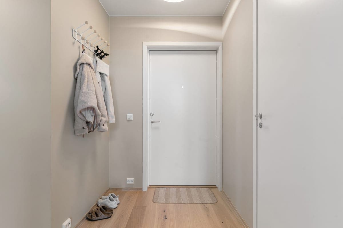 A textured mat inside the front door of a home