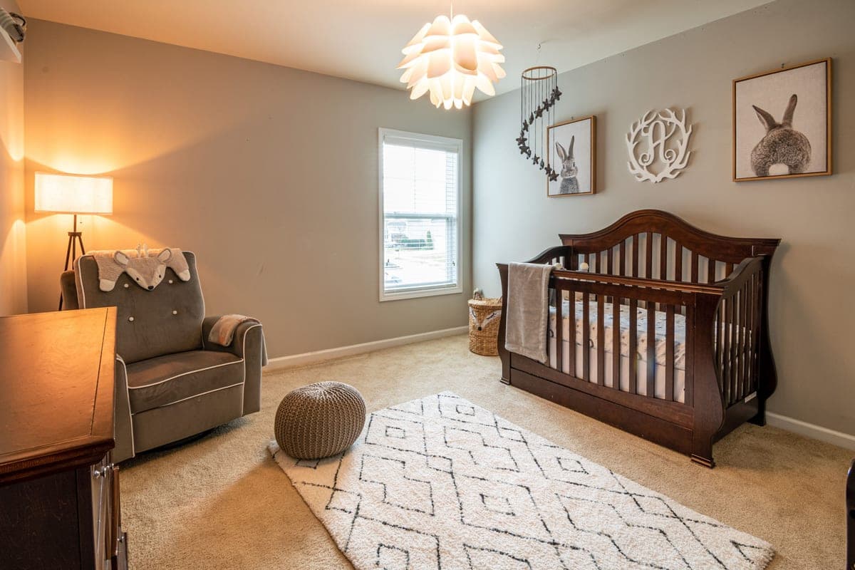 A soft washable rug on the floor of a child's room
