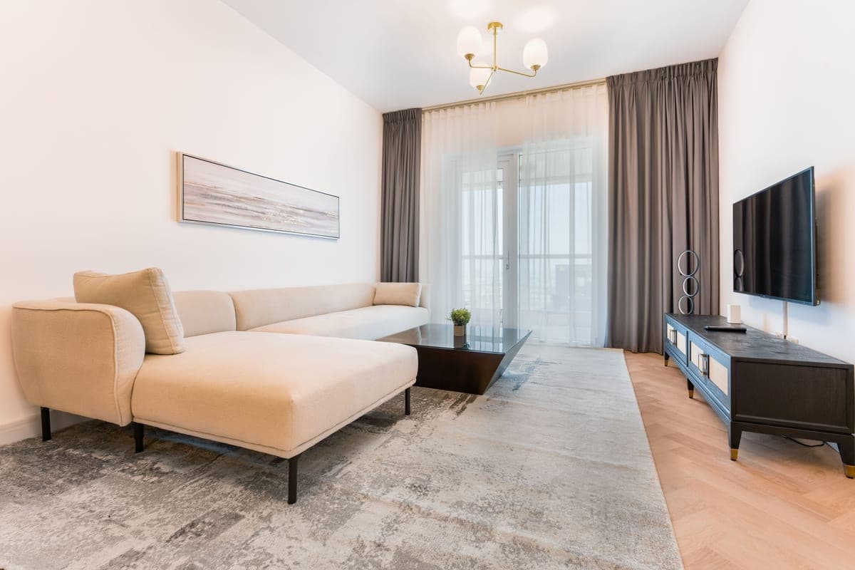 A low-pile washable rug in a bright living room