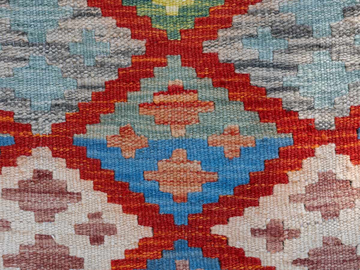 A flatwoven wool rug with a geometric kilim pattern